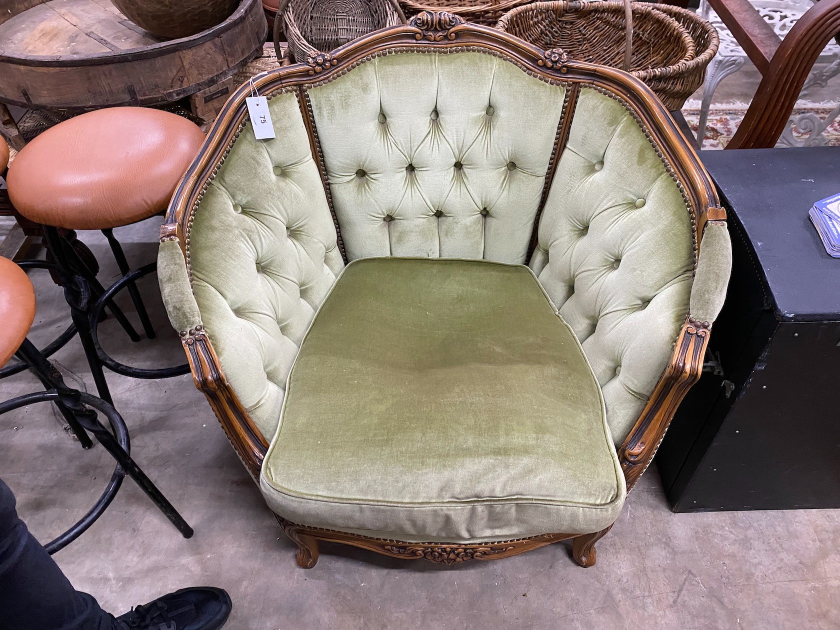 A Louis XVI style upholstered buttoned armchair, width 87cm, depth 60cm, height 80cm